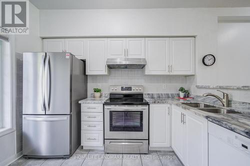 6 - 10 St Moritz Way, Markham, ON - Indoor Photo Showing Kitchen With Double Sink With Upgraded Kitchen
