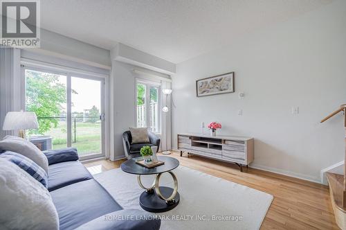 6 - 10 St Moritz Way, Markham, ON - Indoor Photo Showing Living Room