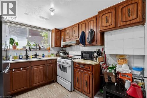 Lower level kitchen features extra large window - 128 Hadeland Avenue, Hamilton, ON 