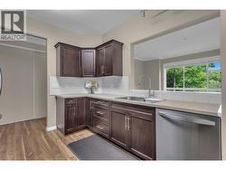 Kitchen looks out over the living room - 