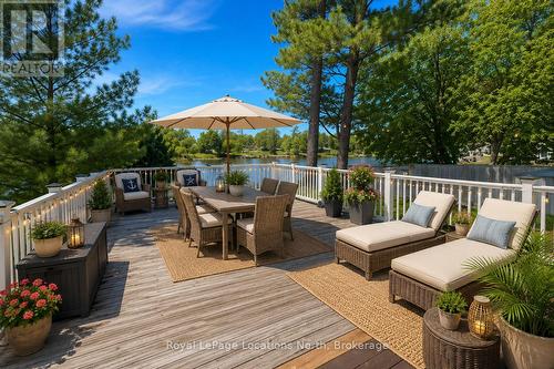 Virtually Staged Deck overlooking River - 32 River Road E, Wasaga Beach, ON 