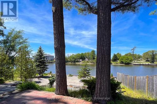 Facing the River - 32 River Road E, Wasaga Beach, ON 