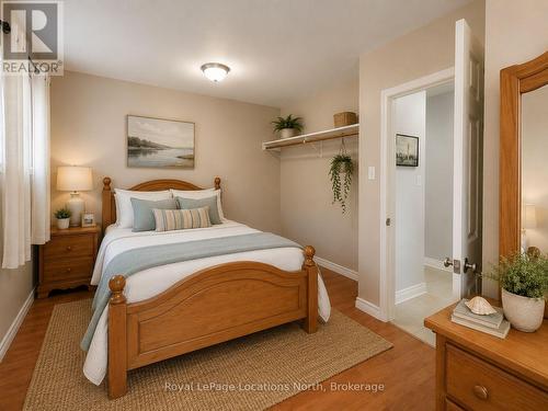 Virtually Staged Main Bedroom - 32 River Road E, Wasaga Beach, ON 