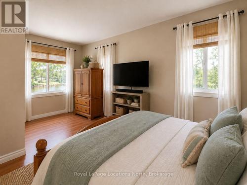 Virtually Staged Main Bedroom - 32 River Road E, Wasaga Beach, ON 