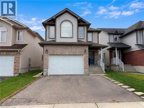 Two-story residence featuring light brick and horizontal siding - 304 Lemon Grass Crescent Unit# B, Kitchener, ON 