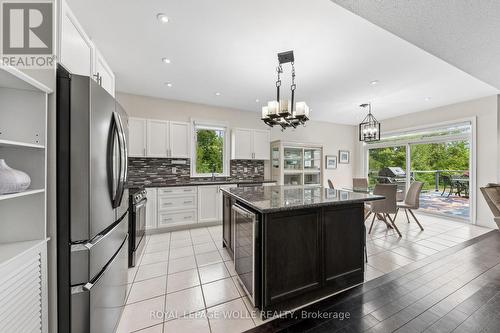 Bar fridge built into island. - 43 Allegra Drive, Wasaga Beach, ON 