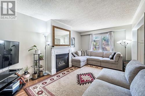 52 Newdale Place, Brampton, ON - Indoor Photo Showing Living Room With Fireplace