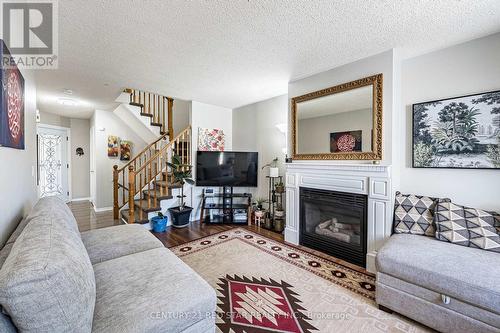 52 Newdale Place, Brampton, ON - Indoor Photo Showing Living Room With Fireplace