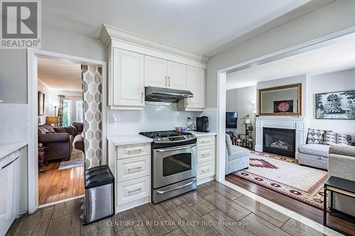 52 Newdale Place, Brampton, ON - Indoor Photo Showing Kitchen With Fireplace