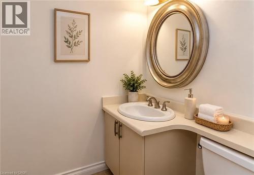 2pc bath, main level, virtual stage - 9 Trafalgar Road, Collingwood, ON - Indoor Photo Showing Bathroom