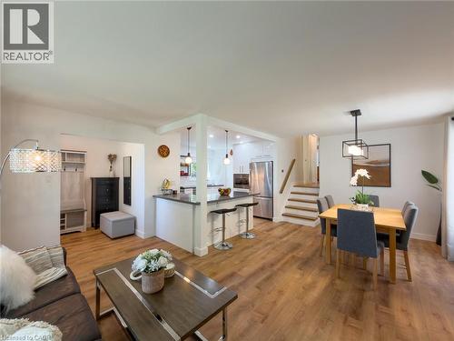Open-concept living space featuring wood-finish flooring throughout - 1324 Bodley Road, Mississauga, ON 