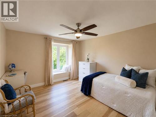 Room with wood-finish flooring, a window seat, and a ceiling fan - 1324 Bodley Road, Mississauga, ON 