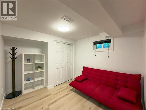 Room featuring light wood-finish flooring and a white color palette - 1324 Bodley Road, Mississauga, ON 