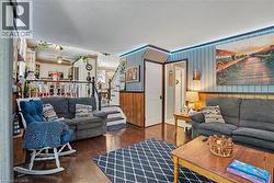Hardwood-finish flooring throughout the main living area - 