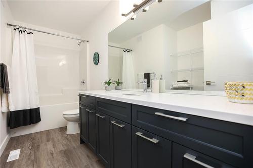 Pictures are of the same floor plan. Might not be exact. - 9 Crocus Lane, West St Paul, MB 
