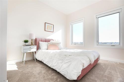 Pictures are of the same floor plan. Might not be exact. - 9 Crocus Lane, West St Paul, MB 