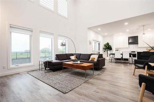 Pictures are of the same floor plan. Might not be exact. - 9 Crocus Lane, West St Paul, MB 