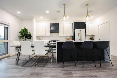 Pictures are of the same floor plan. Might not be exact. - 9 Crocus Lane, West St Paul, MB 