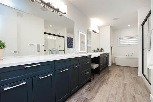 Pictures are of the same floor plan. Might not be exact. - 9 Crocus Lane, West St Paul, MB 