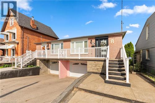 Front aspect of the house. - 202 Ray Street N, Hamilton, ON - Outdoor With Deck Patio Veranda