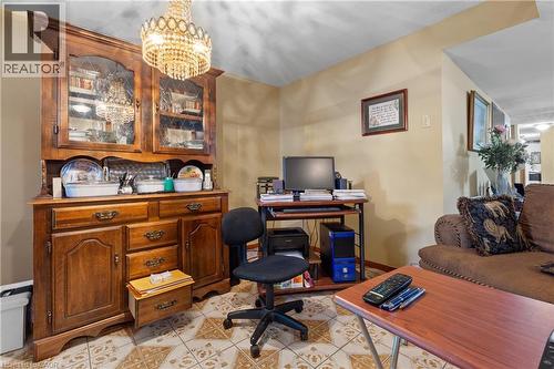 Warm-toned ceramic tile flooring with an intricate pattern. - 202 Ray Street N, Hamilton, ON - Indoor Photo Showing Office