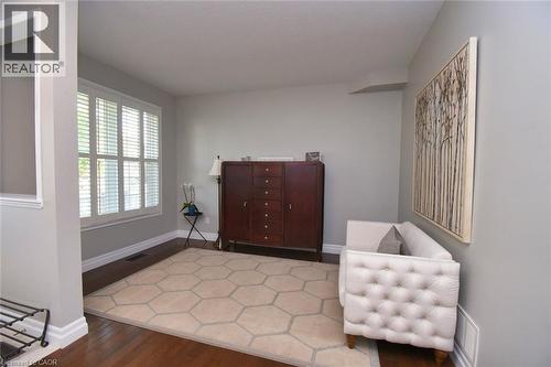 Rich wood-finish flooring complements light gray walls - 188 Hunter Way, Brantford, ON - Indoor