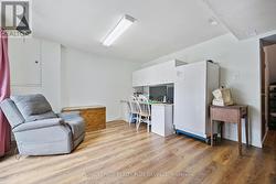 FAMILY RM, W/O TO PATIO, INSIDE ENTRY FROM GARAGE - 