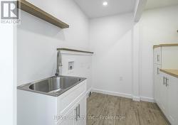 Laundry hook up and sink - 