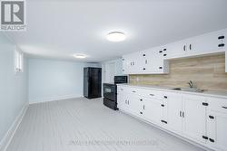 BASMENT KITCHEN - 