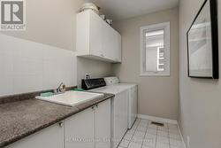 Main floor laundry with garage access - 