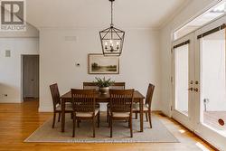 Dining room w/o to patio (virtual staged) - 