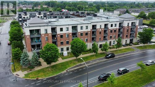 201 - 615 Longfields Drive, Ottawa, ON - Outdoor With Balcony With Facade