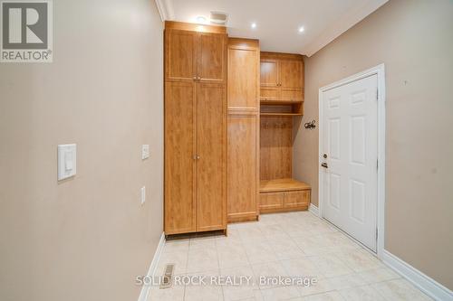 Mudroom with matching cabinetry and hidden laundry - 32 Albert Roffey Crescent, Markham, ON 