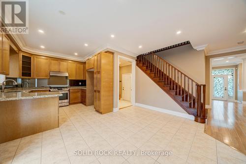 Off the kitchen- access to the garage. - 32 Albert Roffey Crescent, Markham, ON 