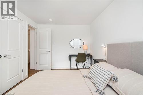 Room with white walls and wood-finish flooring - 39 Forestgate Drive, Hamilton, ON 