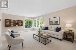 Virtually Staged - Living Room with Corner Windows - 