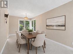 Virtually Staged - Dining Room with Corner Windows - 