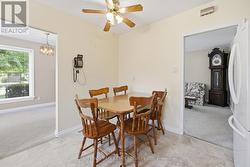 Eat-In Kitchen Offers Convenient Side Yard Access - 