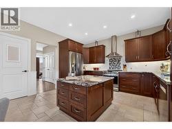 Spacious Kitchen With Large Island And Ample Prep & Storage Space - 