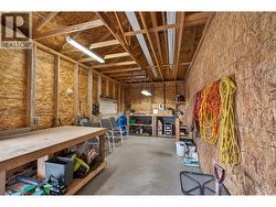 Dedicated Workshop Space At The Rear Of The Garage Perfect For Projects And Storage - 