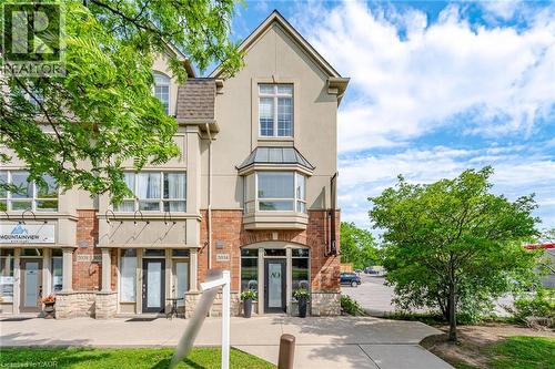 Commercial Entrance Along Fairview St - 5035 Bidwell Common, Burlington, ON - Outdoor With Facade