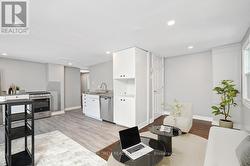 Unit B-Virtually Staged Living Room/Kitchen Area - 