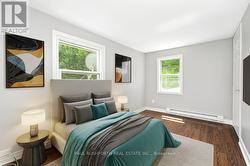 Unit B-Virtually Staged Bedroom - 