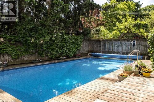 131 Chedoke Avenue, Hamilton, ON - Outdoor With In Ground Pool With Deck Patio Veranda With Backyard