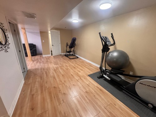 Salle familiale - 1592 Tsse Pilon, Laval (Chomedey), QC - Indoor Photo Showing Gym Room