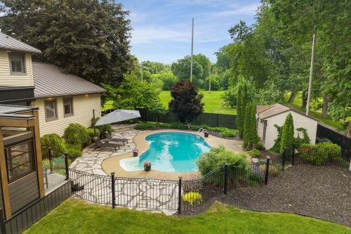 Pool - 66 Rue De Coulomb, Saint-Jean-Sur-Richelieu, QC - Outdoor With In Ground Pool With Backyard