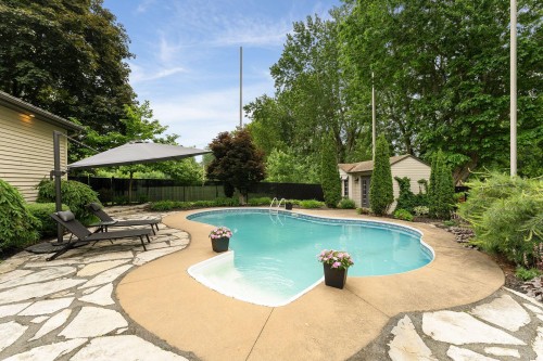 Pool - 66 Rue De Coulomb, Saint-Jean-Sur-Richelieu, QC - Outdoor With In Ground Pool With Backyard