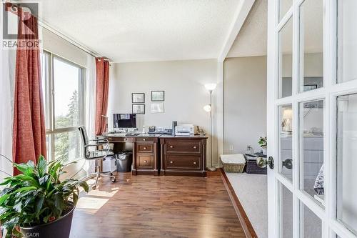 Room with wood-finish flooring, a large window, and light-toned wall paint - 1201 North Shore Boulevard E Unit# 706, Burlington, ON - Indoor Photo Showing Office