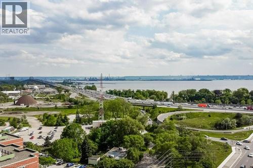 Expansive water body and bridge visible in the distance - 1201 North Shore Boulevard E Unit# 706, Burlington, ON - Outdoor With Body Of Water With View