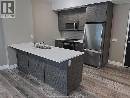955 OUELLETTE AVENUE Unit# 403 , Windsor, Ontario N9A 4J5 5